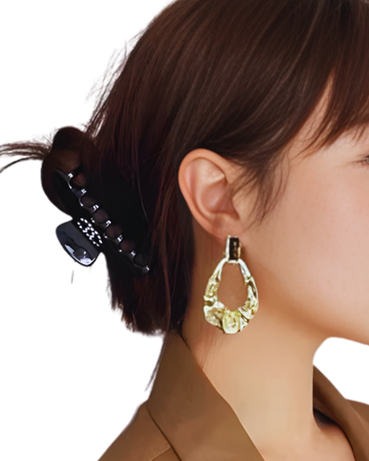 Brinco Woman — banhado a ouro 18k em aço inoxidável